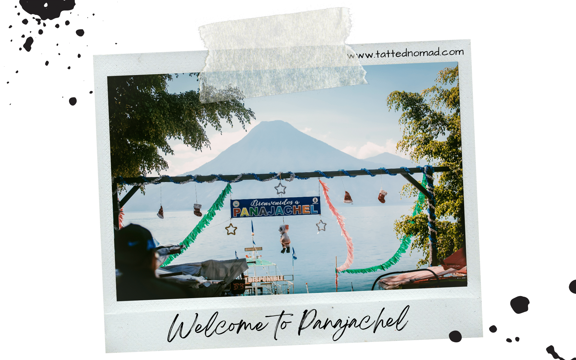 welcome to panajachel sign with volcano panajachel lake atitlan